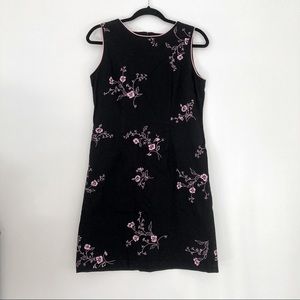 Black dress with pink, floral embroidery